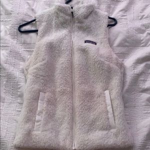 White fluffy Patagonia vest.